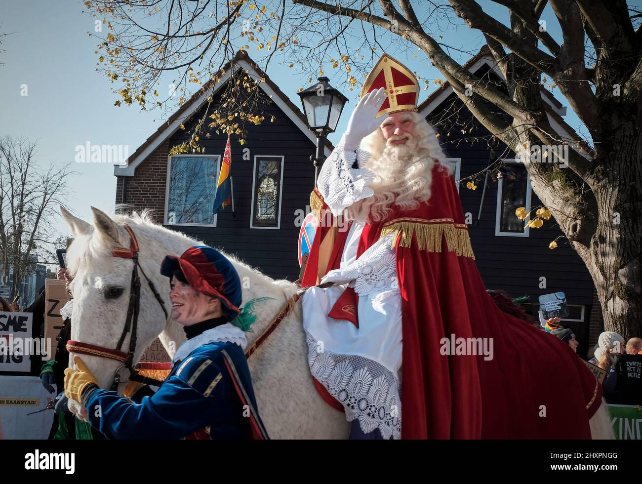 St. Nicholas, riding his horse Amerigo, roams the streets of Zaandam greeting all attendees to the event Stock Photo