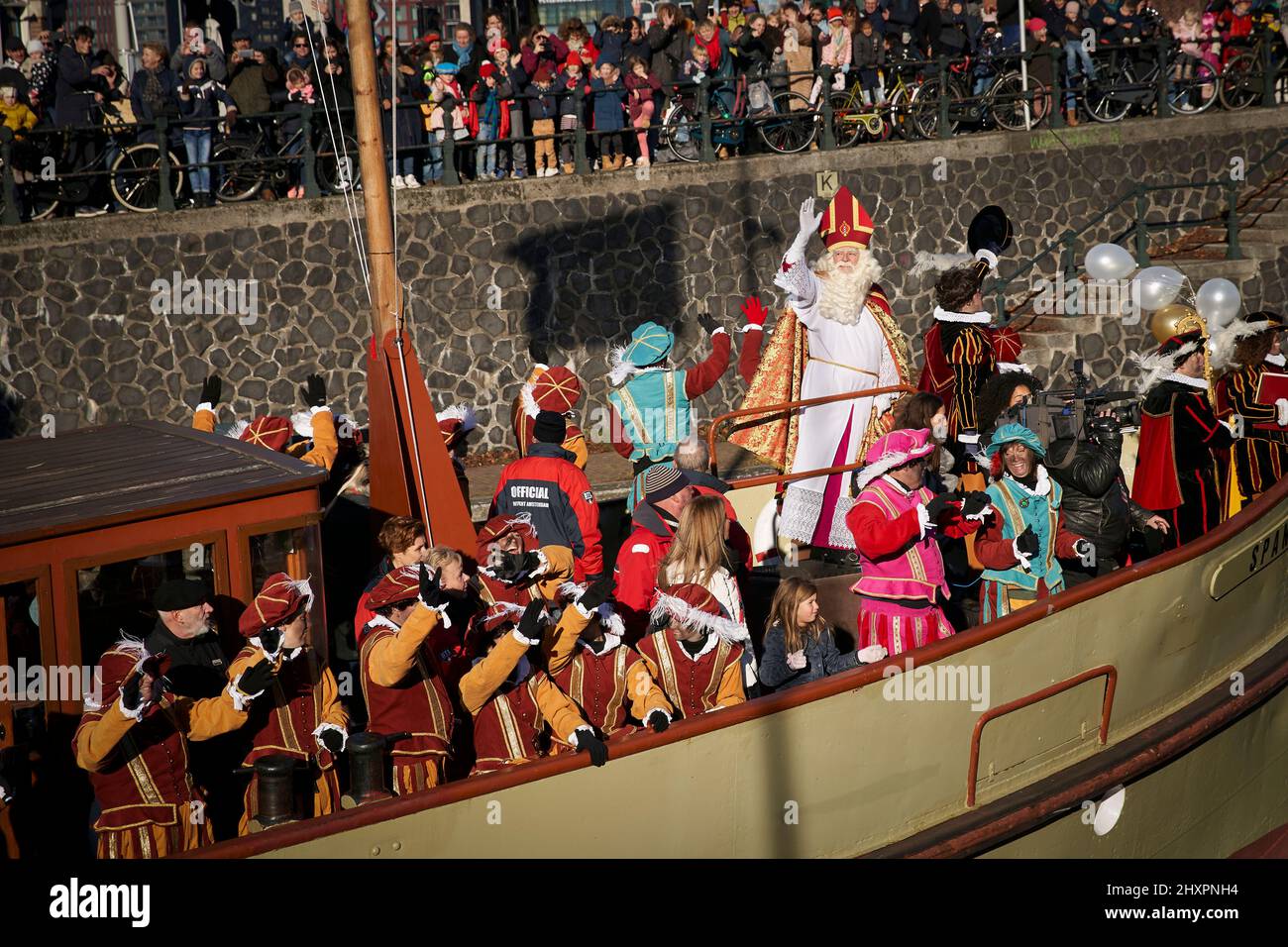 St. Nicholas arrives on his boat sailing the canals of Amsterdam Stock Photo