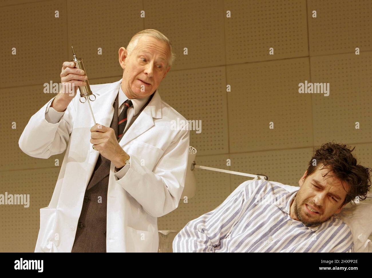 l-r: Jeremy Child (Doctor), James Clyde (Spike Milligan) in YING TONG by Roy Smiles at the West Yorkshire Playhouse, Leeds, England  28/10/2004  design: Peter McKintosh  lighting: Tony Simpson  director: Michael Kingsbury Stock Photo