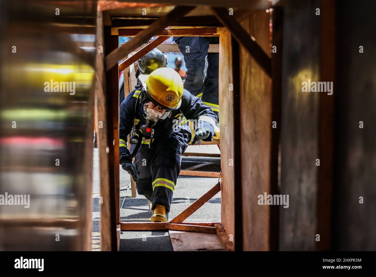 Quezon City. 14th Mar, 2022. A female firefighter participates in the ...