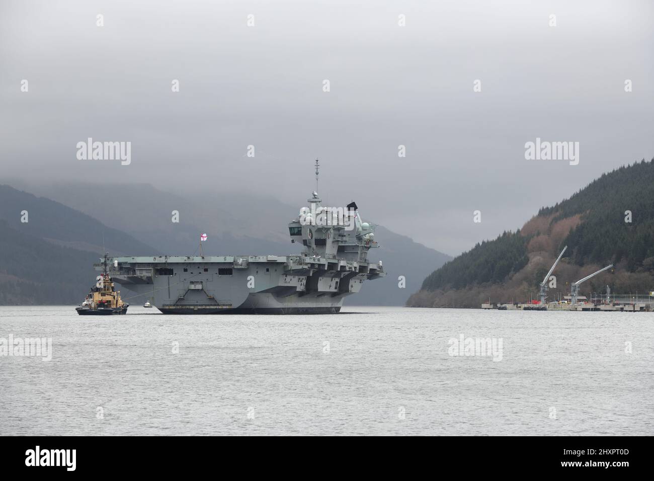 14th, March, 2022. Glenmallan, Scotland, UK. HMS Queen Elizabeth visits Glenmallan on Loch Long on a logistics visit and to continue training. GPS operation and air space restrictions are in place due to the ship being on high alert. Credit. Douglas Carr/Alamy Live News Stock Photo