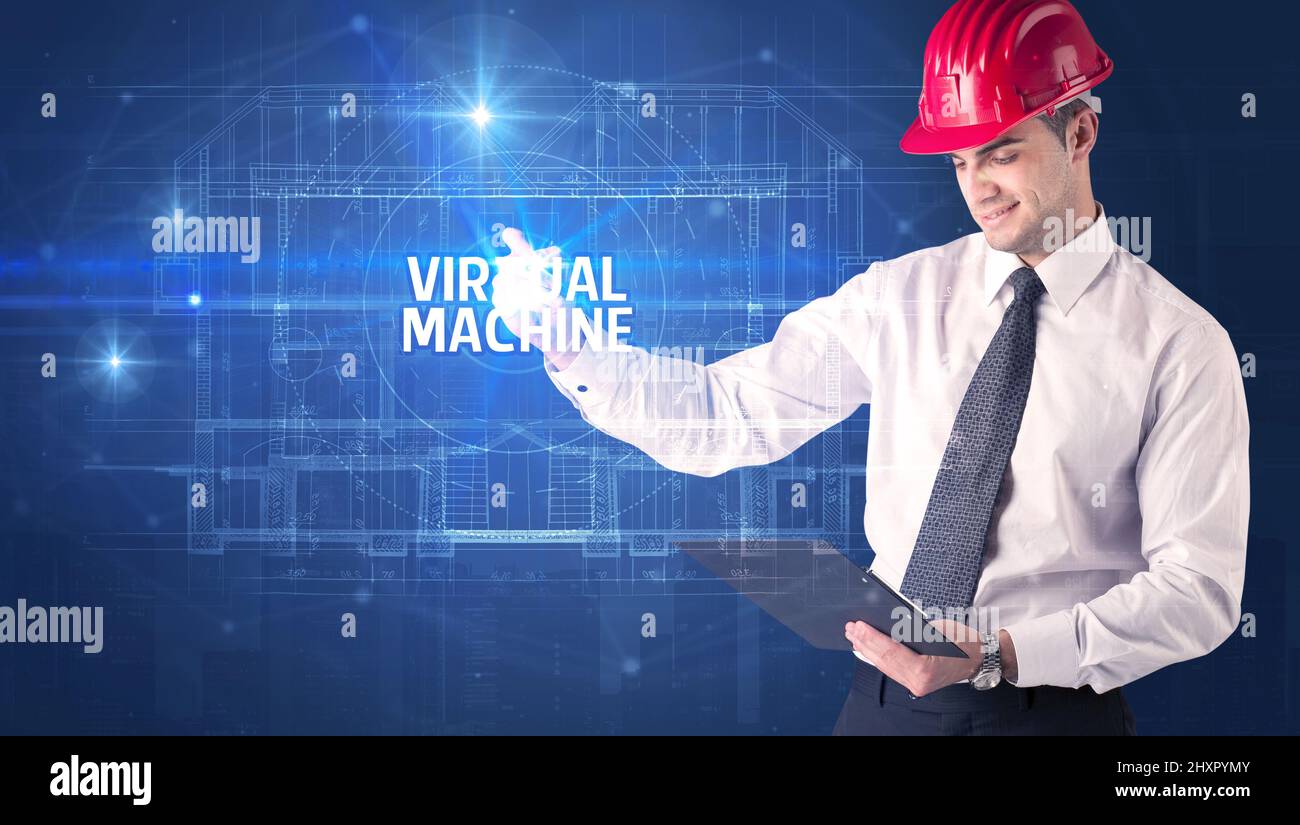 Handsome architect drawing with helmet Stock Photo Alamy