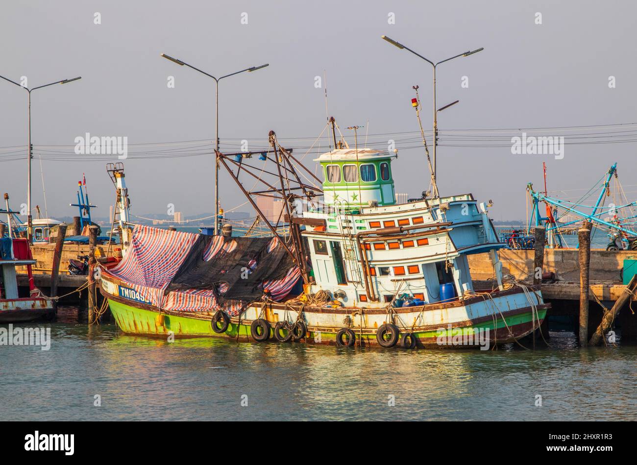 fisher boats at a fishing Pier in Thailand Stock Photo