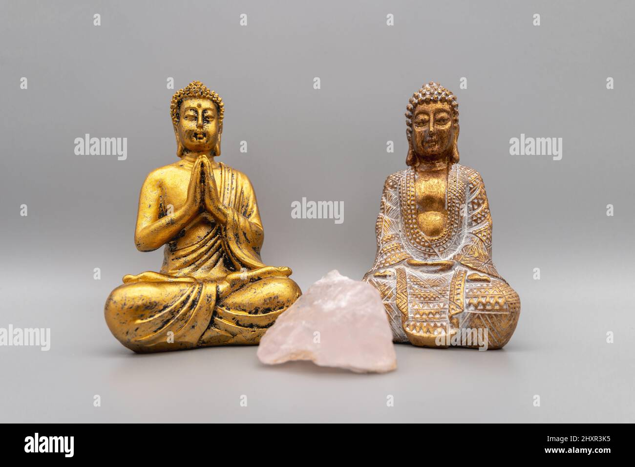 A horizontal shot of Buddha statues. Stock Photo