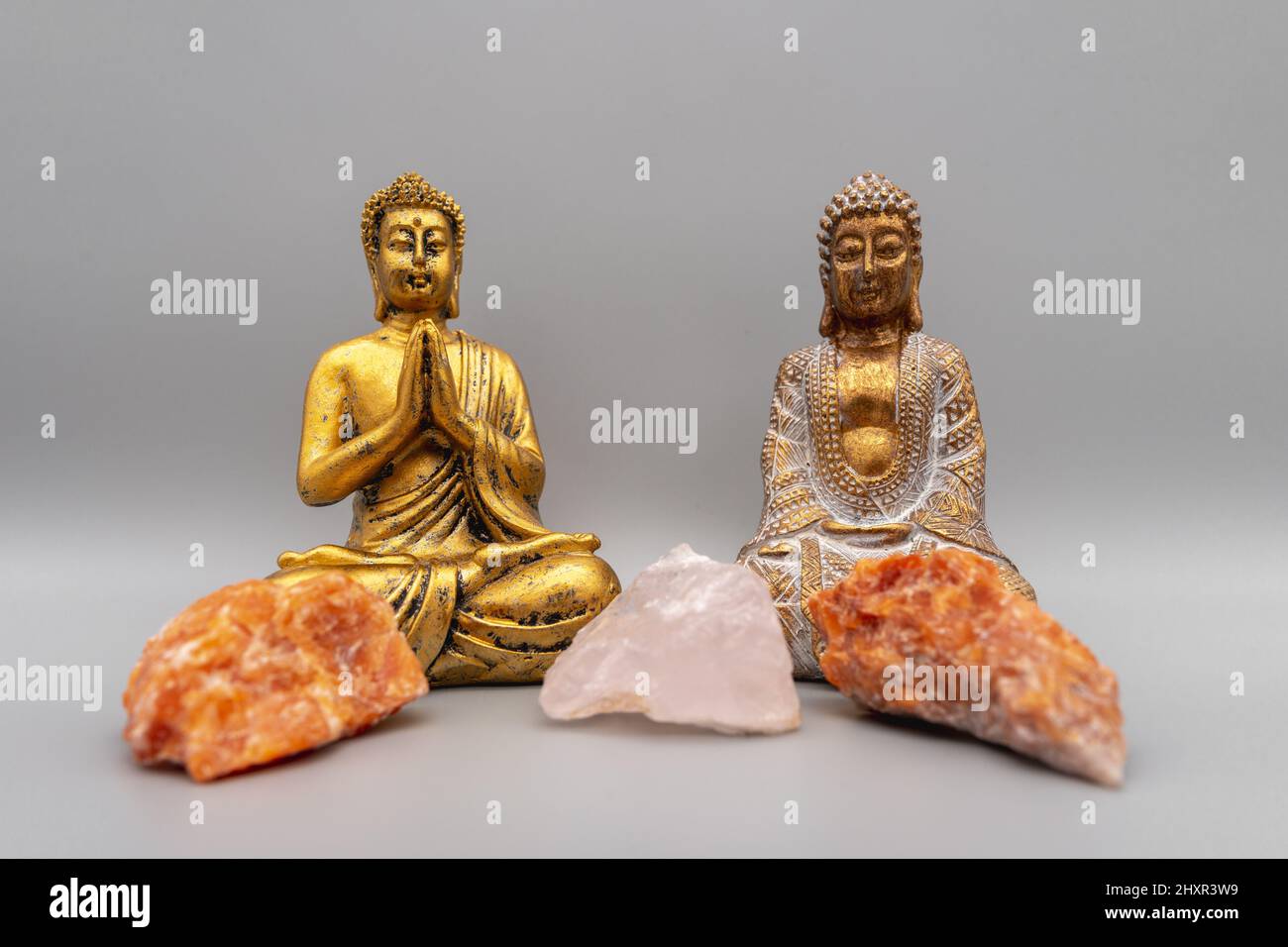 A horizontal shot of Buddha statues. Stock Photo