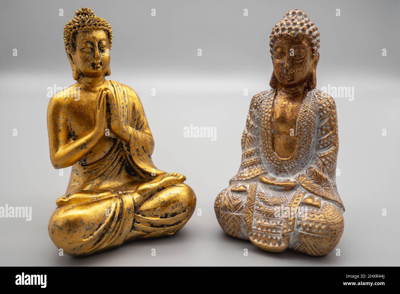 A horizontal shot of Buddha statues. Stock Photo