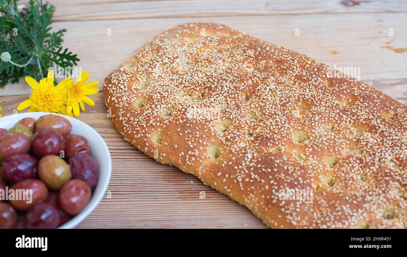 Bread with sesame, without dough, Greek traditional bread called lagana