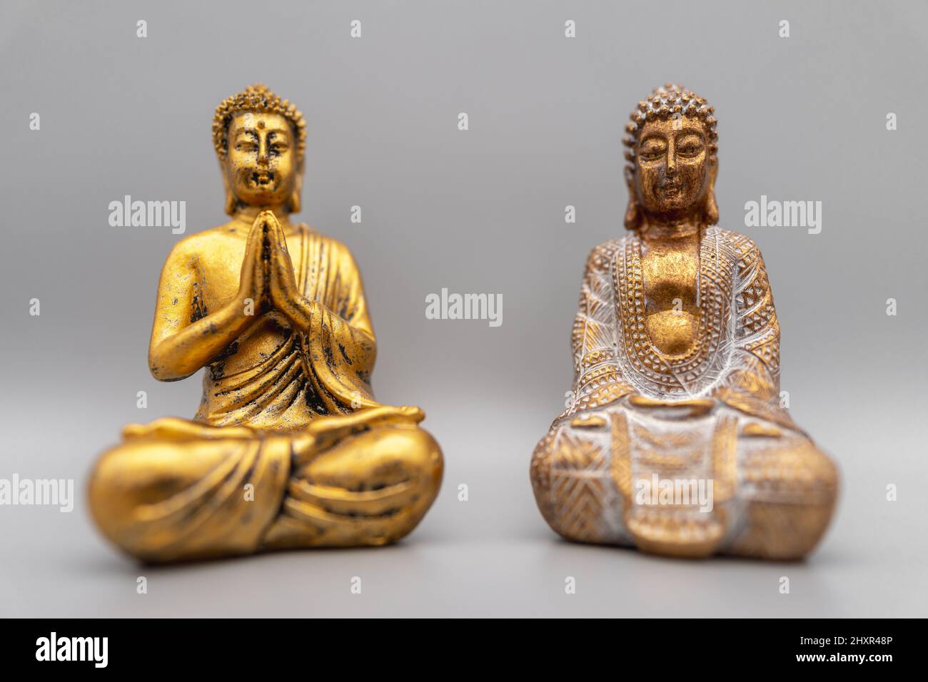 A horizontal shot of Buddha statues. Stock Photo