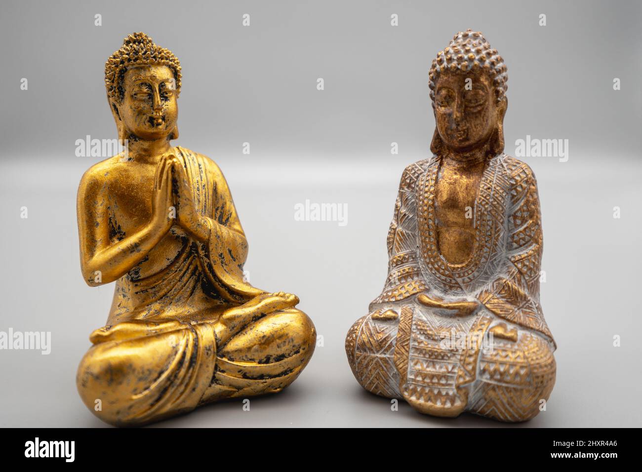 A horizontal shot of Buddha statues. Stock Photo