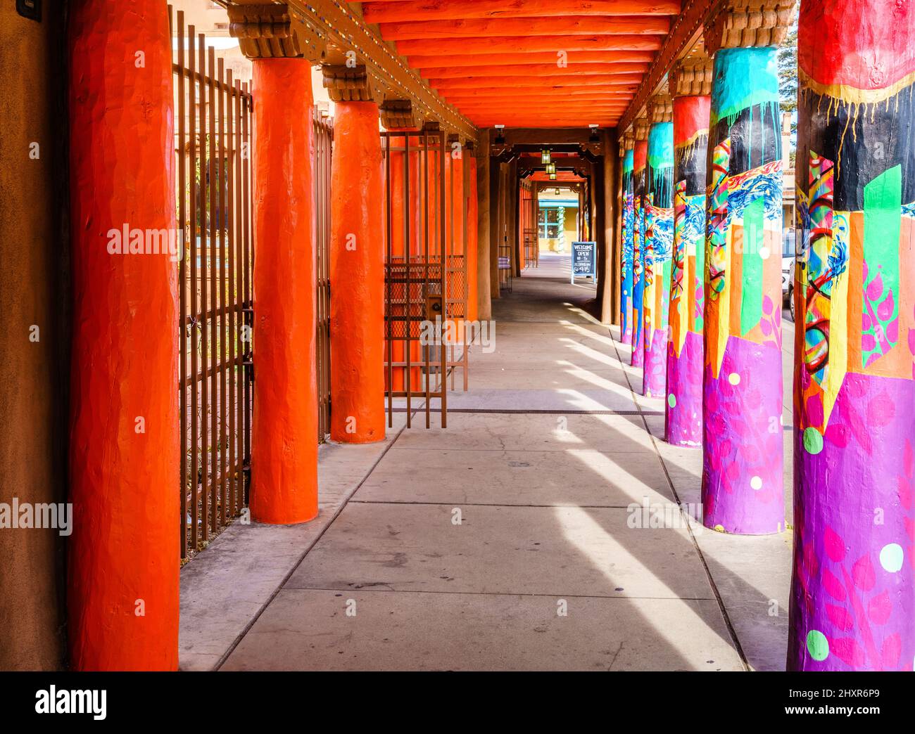 Brightly painted colonnade in central plaza in Santa Fe, New Mexico Stock Photo