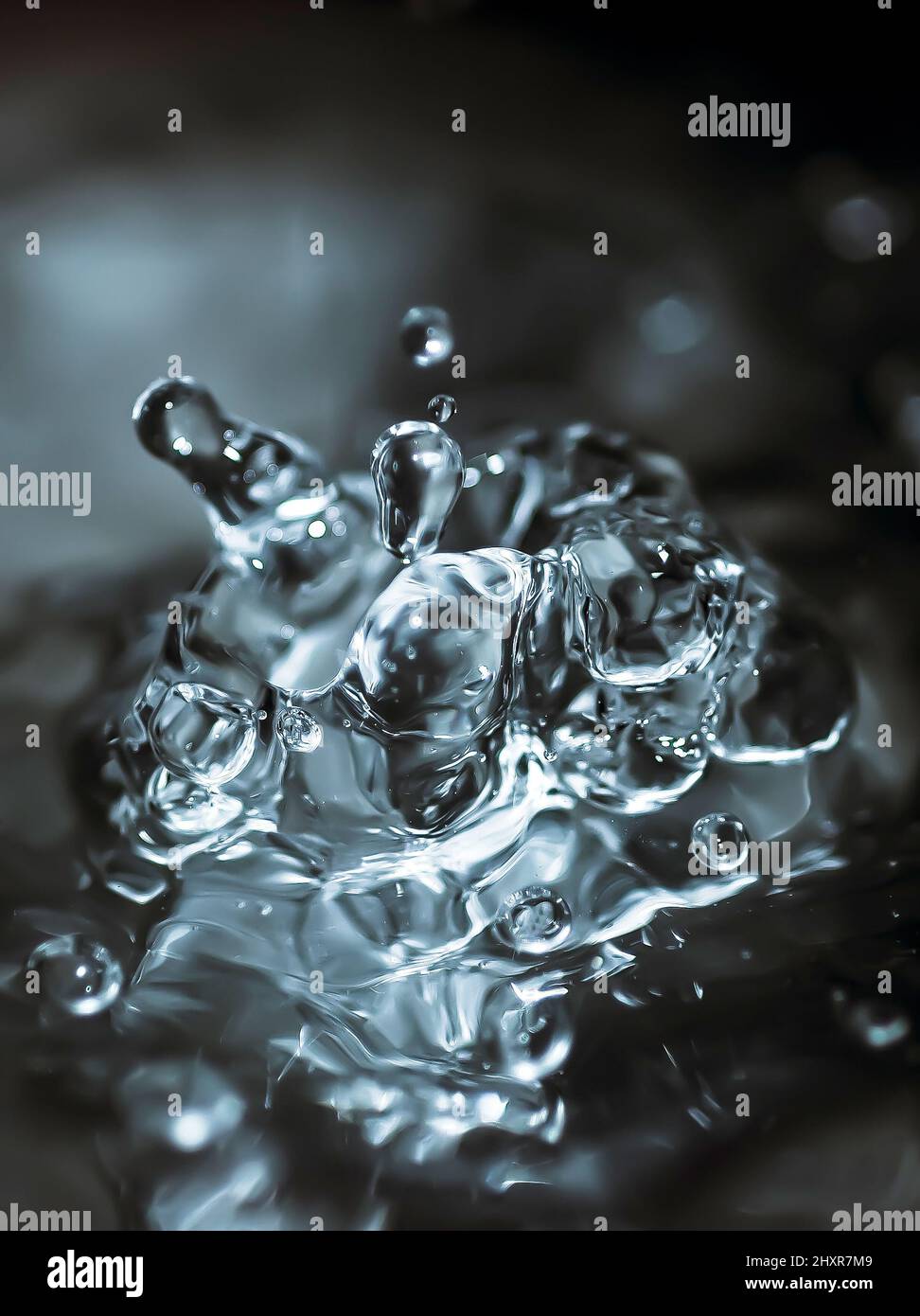 Falling water drop splash Stock Photo Alamy