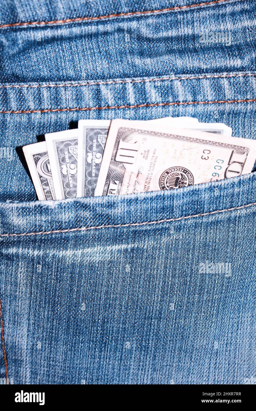 Dollars in my pocket Stock Photo - Alamy