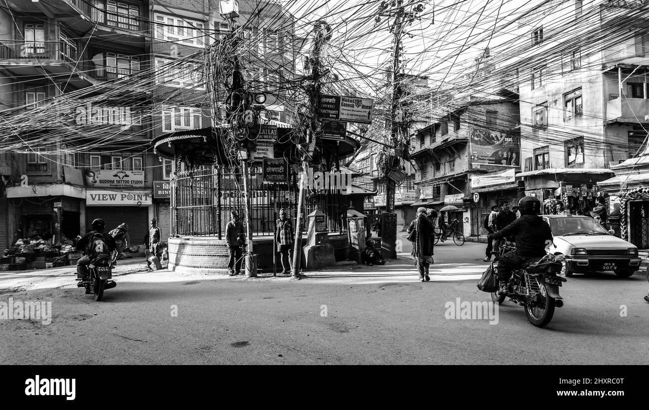 Kathmandu, Nepal - November 17, 2018: Nepali people going down the street in Thamel district. Stock Photo