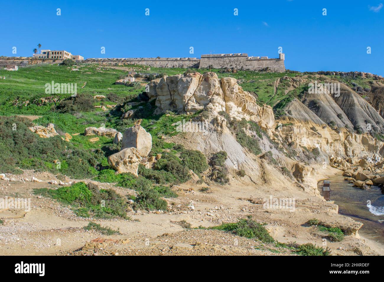 Panoramic view of hills and Fort Chambray, in Gozo, Malta, fortress built by Order of St John Stock Photo