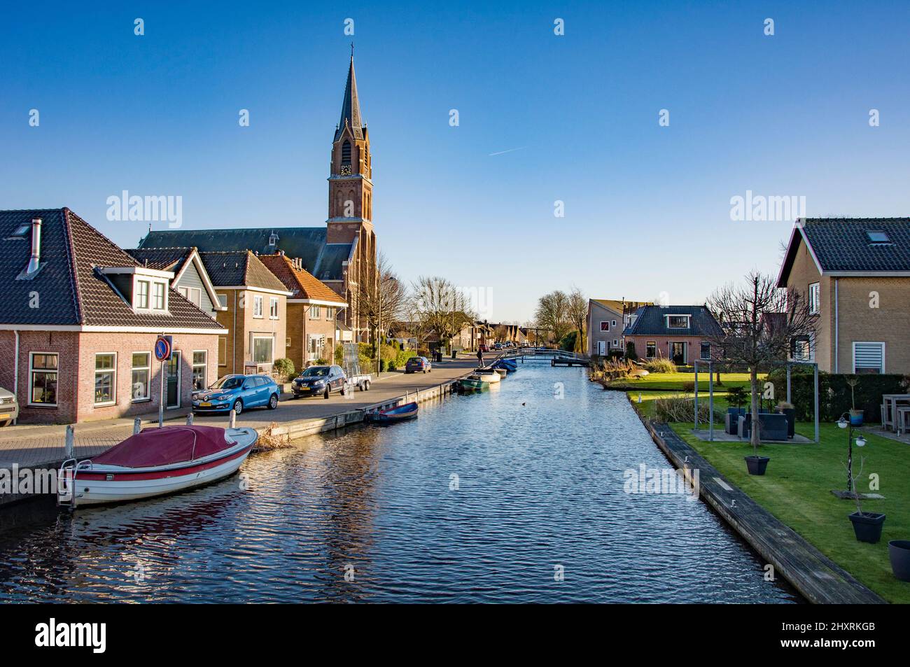 NOORDWIJK BINNEN, NETHERLANDS. FEBRUARY 27, 2022. Beautiful view to the chanel and embankment. Small village Stock Photo