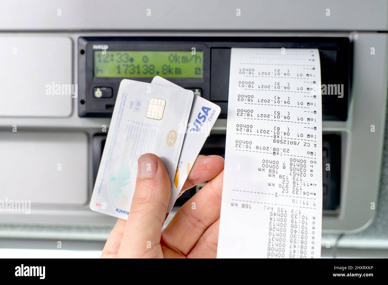 Olomouc Czech Rep Jan 7th 2021 Hand holding a driver digital card, bank  debit card infront of a digital tachograph. No personal data Stock Photo -  Alamy