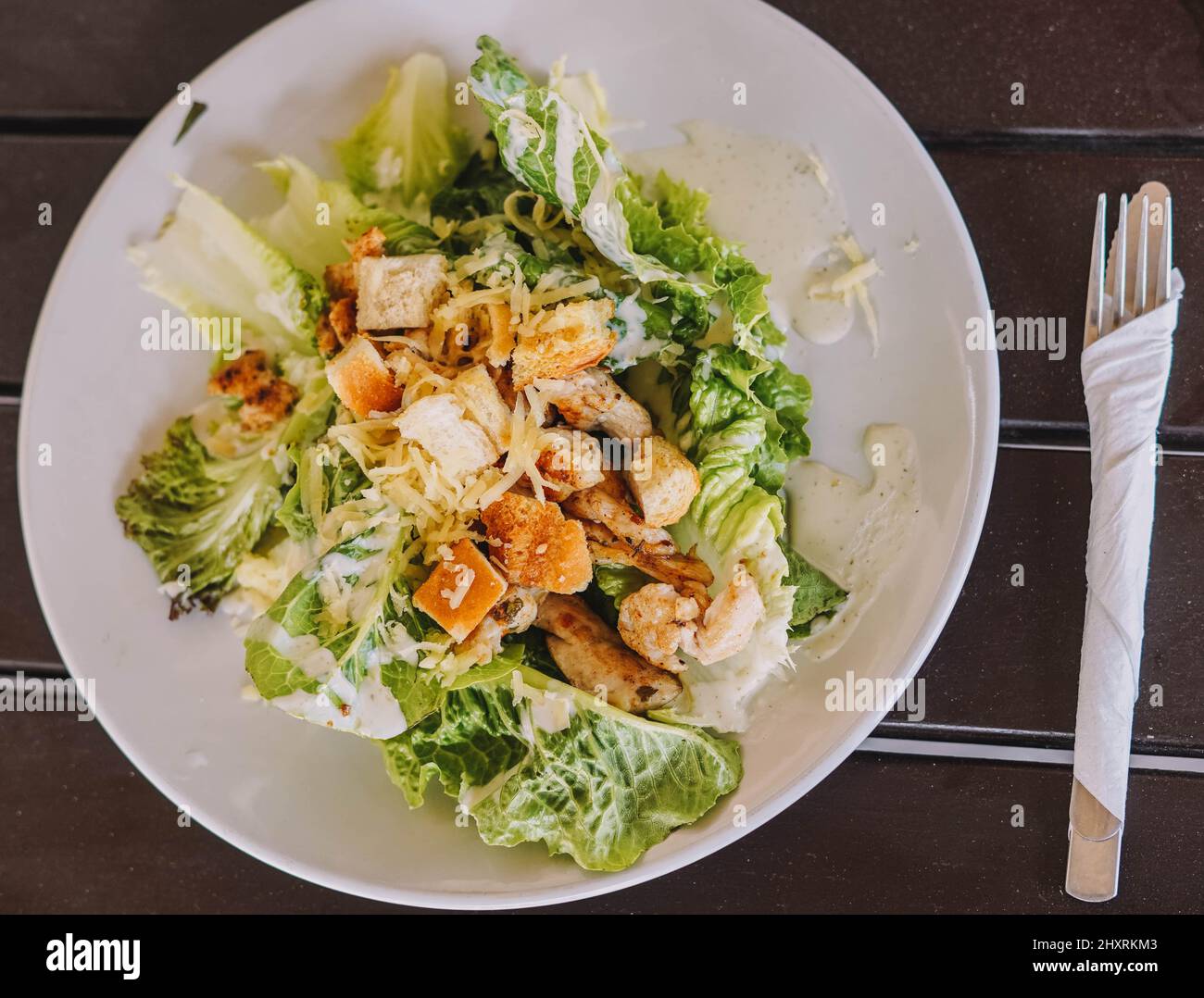 Chicken caesar salad with cheese Stock Photo