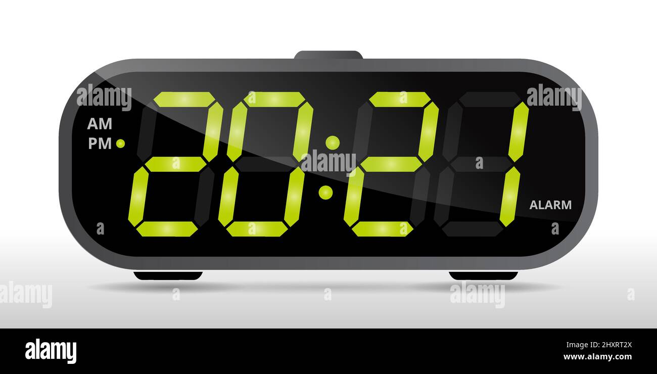 black digital alarm clock with green numbers 2021 symbol of new year on