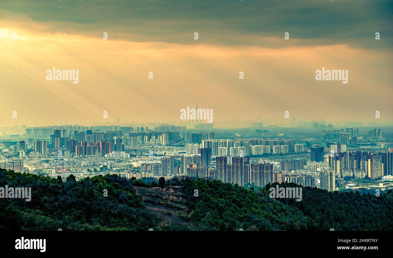 Aerial view of a cityscape under a sunset cloudy sky Stock Photo - Alamy
