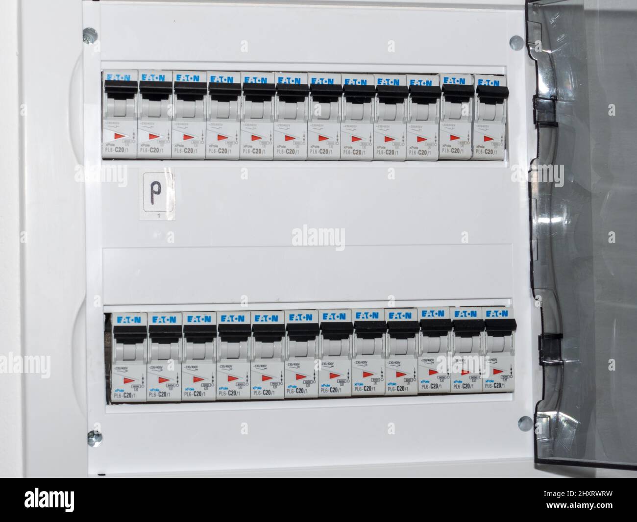 Closeup of a switchboard on a white wall Stock Photo Alamy
