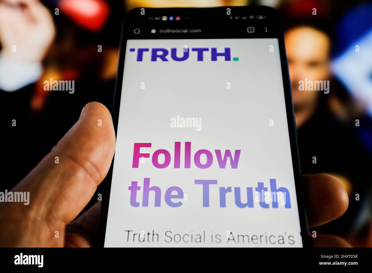 The TRUTH Social website is seen on a mobile device with an image of