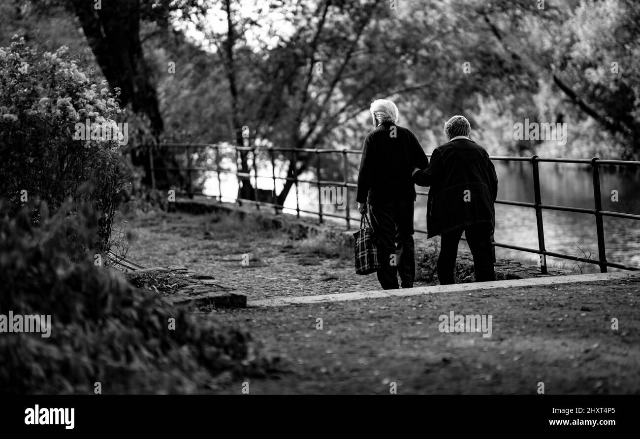 Elderly Couple Walking Black And White