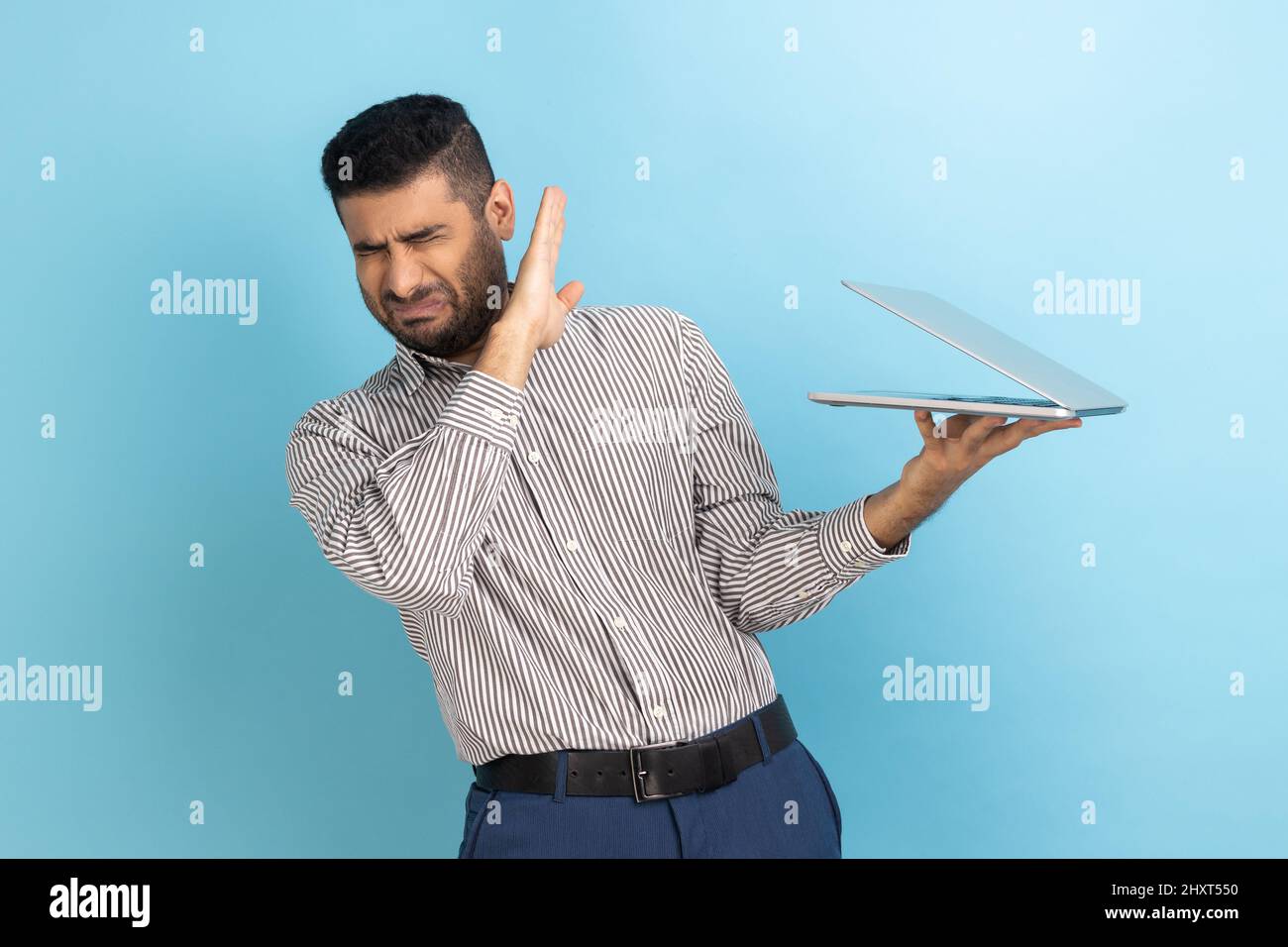 Ignoring Behind Computer Screen Don't want to look. Businessman showing stop to half open laptop screen ...