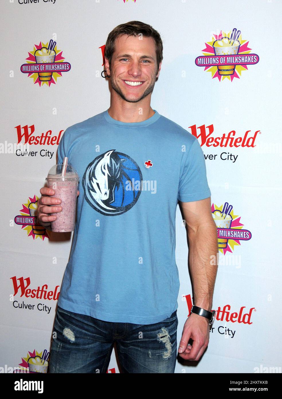 Jake Pavelka creates a signature milkshake to benefit the American Red Cross efforts in Japan at Millions of Milkshakes in the Westfield Culver City Mall. Stock Photo