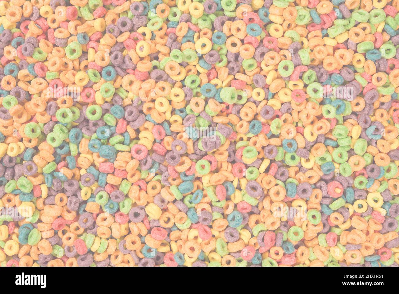 Sweet multicolored flakes, cereal loops as a background.. Stock Photo