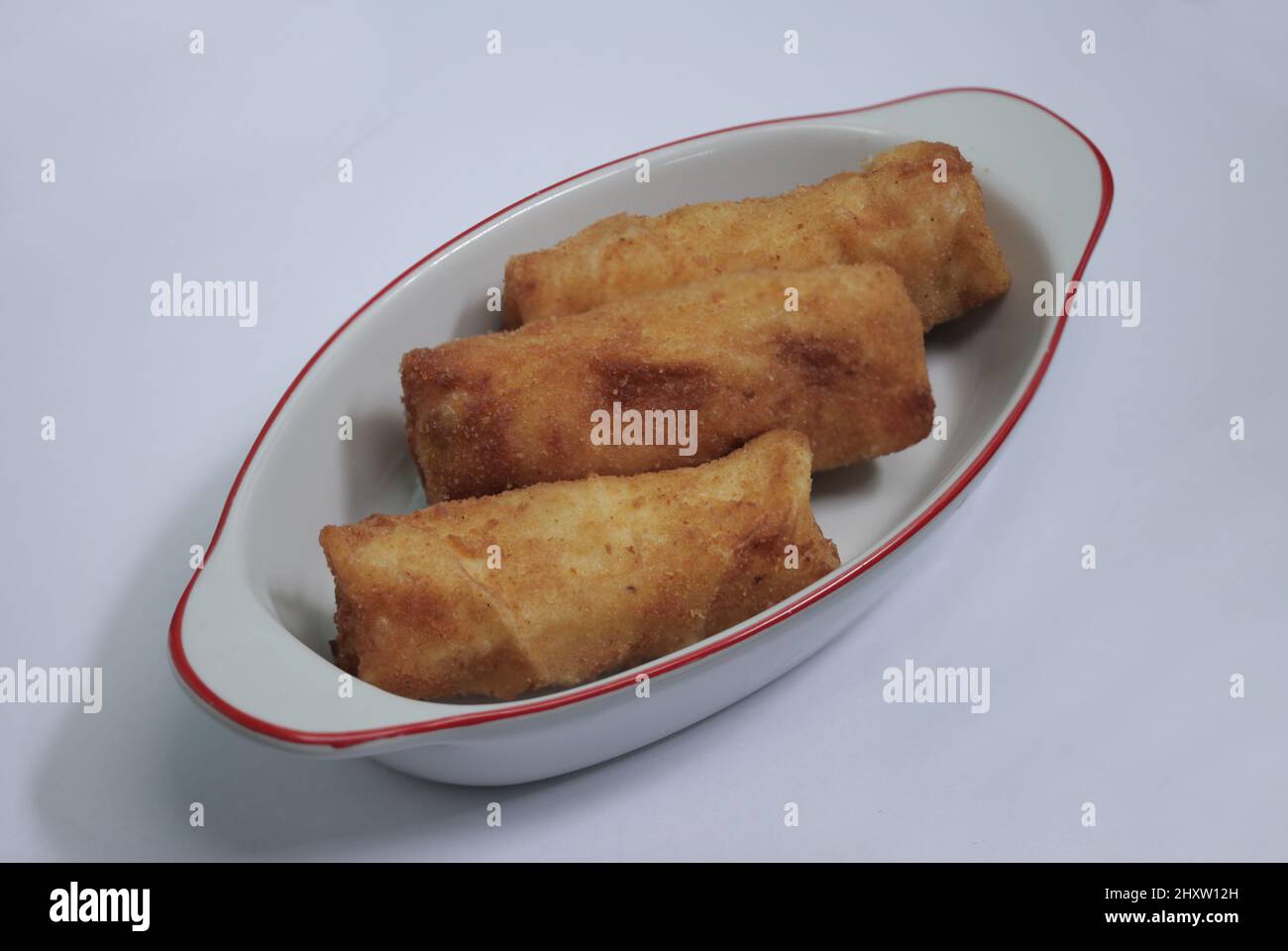 Closeup of traditional Risol with egg and mayonnaise on a white ...