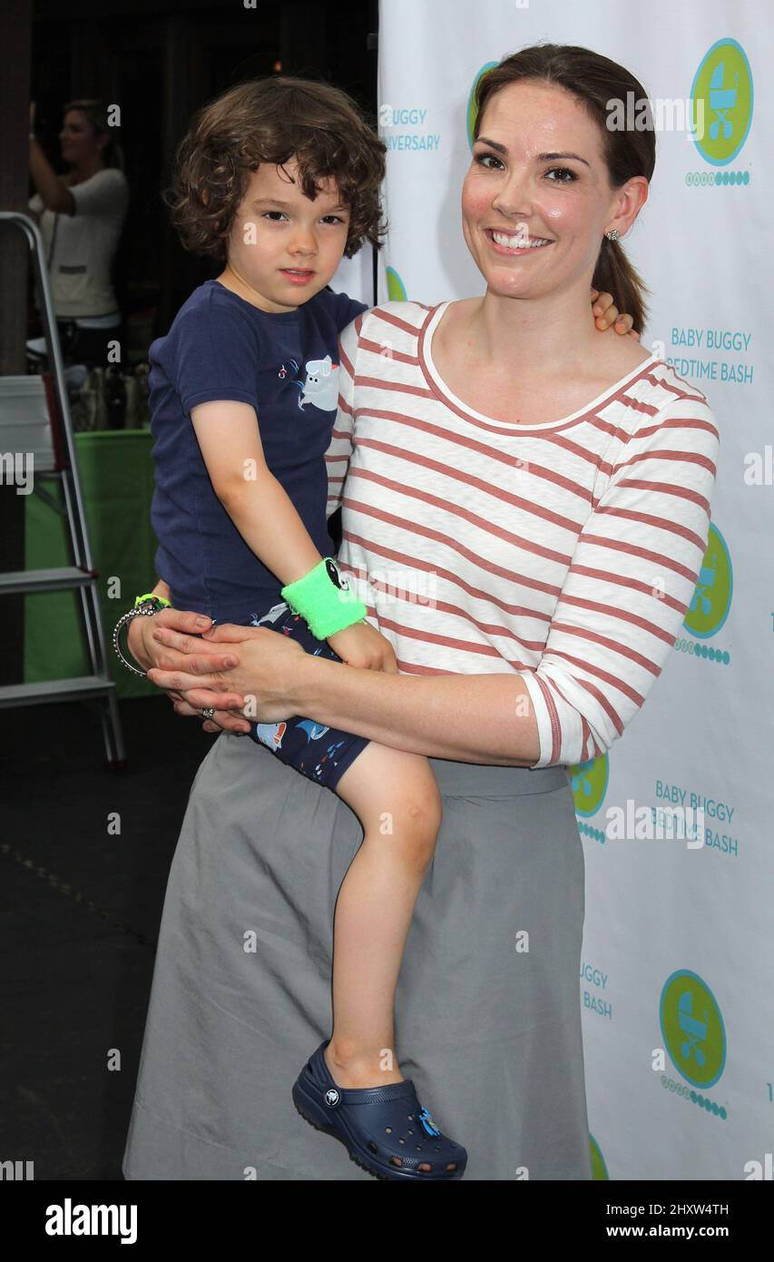 Erica Hill and son Weston Hill at the 10th Anniversary Baby Buggy Bedtime Bash held at Victorian Gardens at Wollman Rink in Central Park, New York. Stock Photo