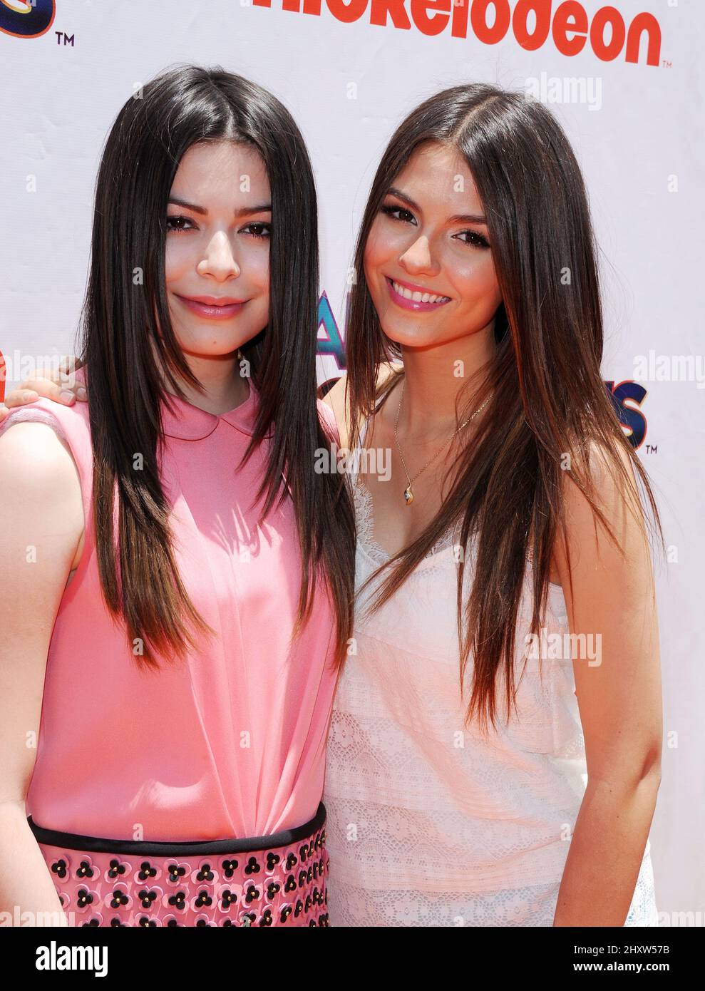 Miranda Cosgrove and Victoria Justice during the 'iParty With Victorious' Special Screening Event held at The Lot, California Stock Photo