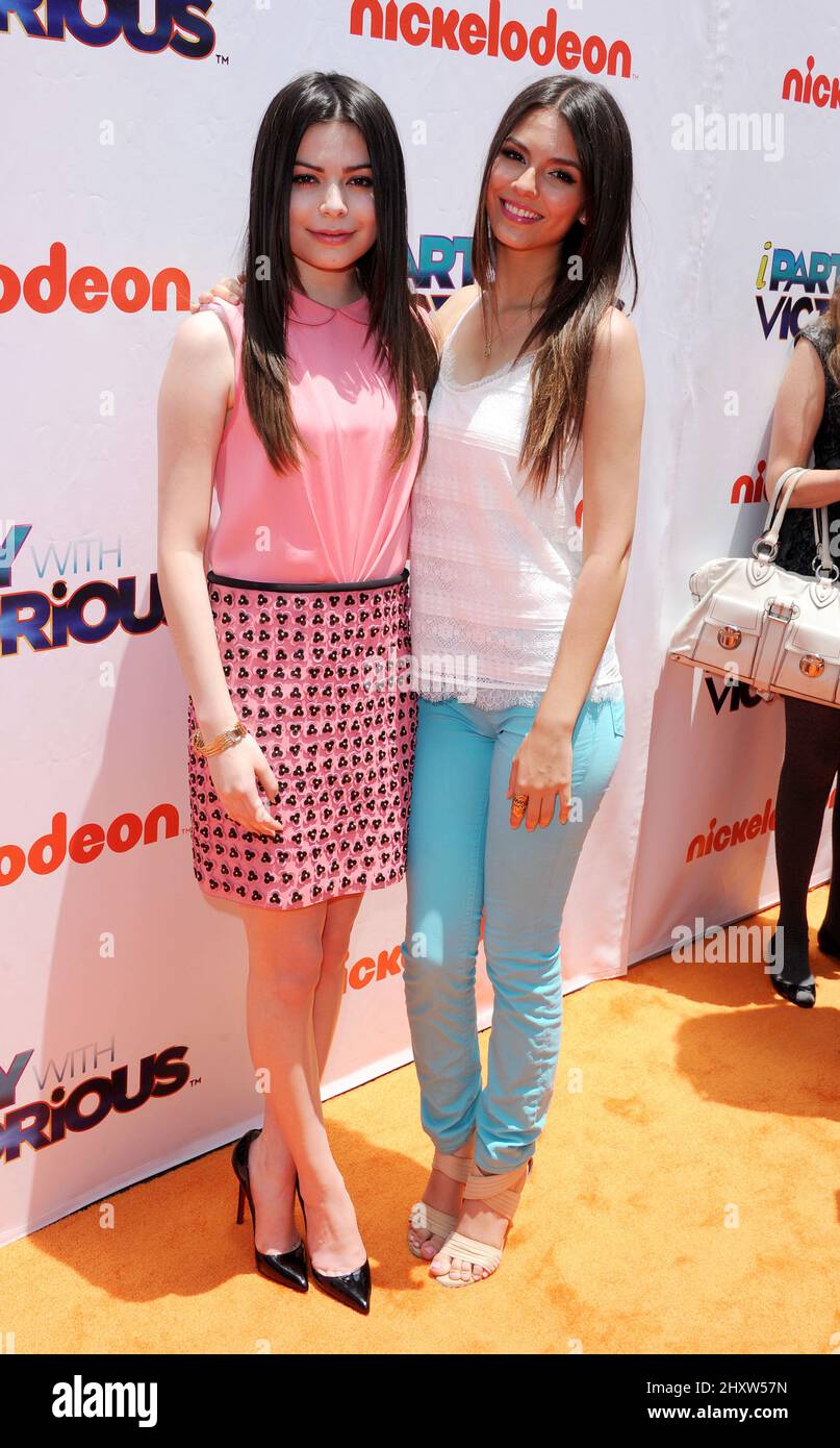 Miranda Cosgrove and Victoria Justice during the 'iParty With Victorious' Special Screening Event held at The Lot, California Stock Photo
