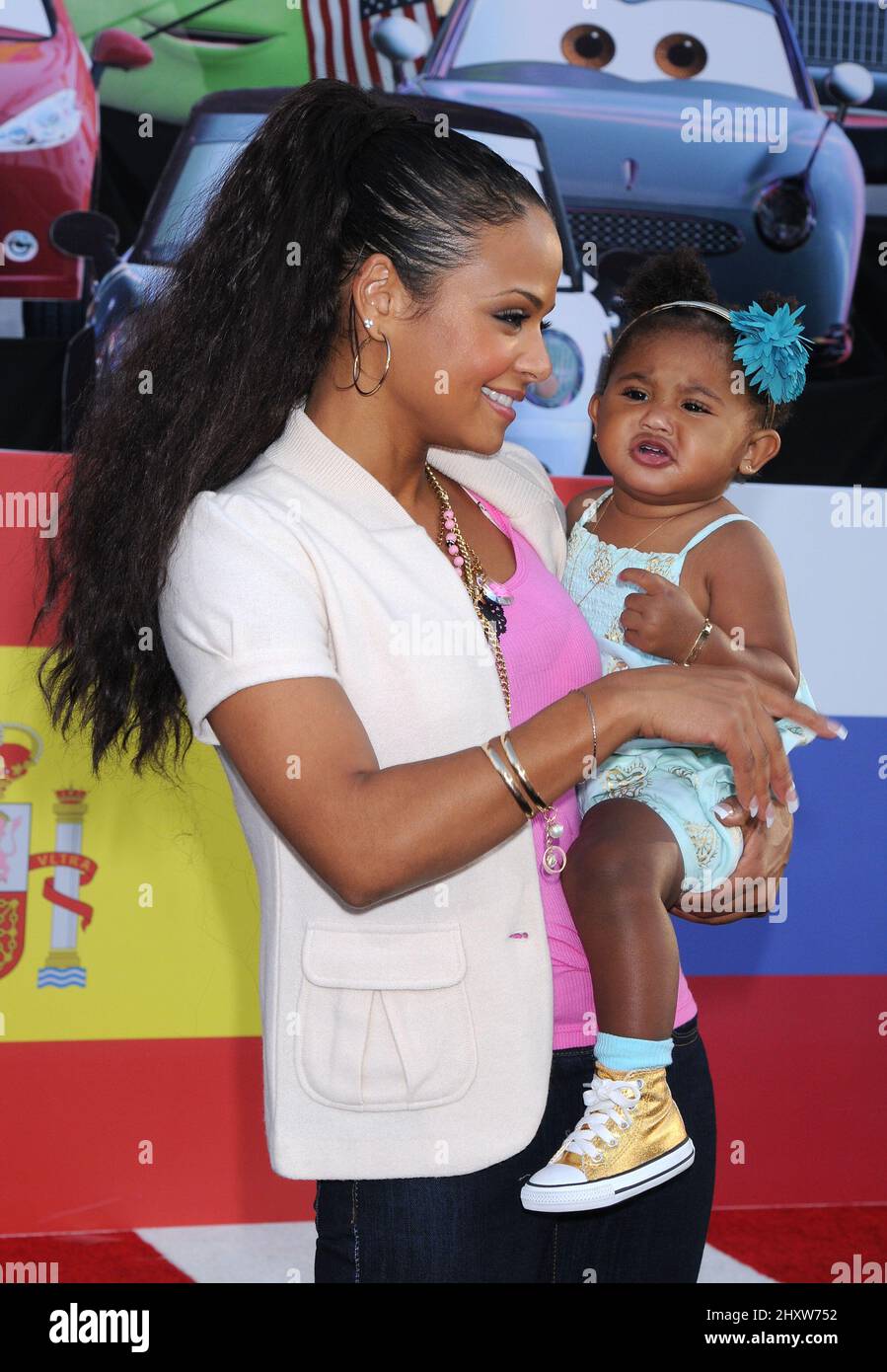 Christina Milian, daughter Violet at Cars 2 Premiere at the El Capitan  Theatre In Los Angeles.Christina Milian, daughter Violet 72 -------------  Red Carpet Event, Vertical, USA, Film Industry, Celebrities, Photography,  Bestof, Arts, image size:899x1390