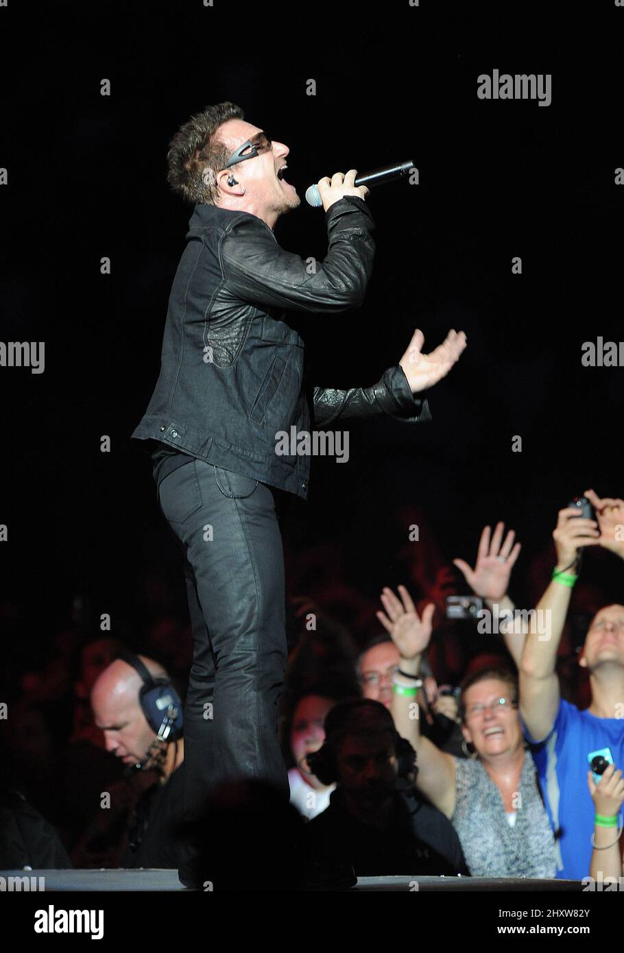 Bono of the band U2 performs live in concert at the M & T Bank Stadium in Baltimore, Maryland, USA. Stock Photo