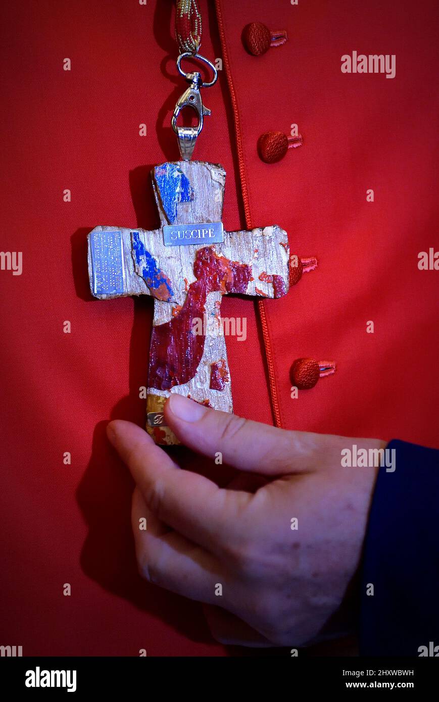 Cardinal Michael Czerny chose a cross made with wood from the cross as a coat of arms, it comes from a boat used to cross the Mediterranean sea and arrive to Lampedusa by migrants. The plaque behind shows the word Suscipe, which means to receive. Pope Francis appoints 13 new cardinals at the 2019 Ordinary Public Consistory, choosing prelates whose lifelong careers reflect their commitment to serve the marginalized and local church communities, hailing from 11 different nations and representing multiple religious orders. Stock Photo