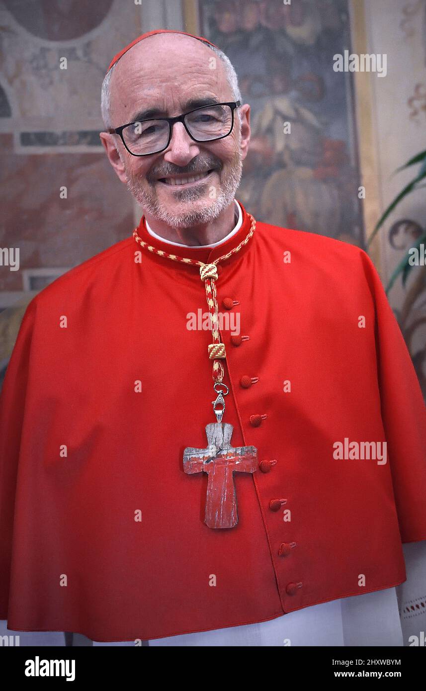 Cardinal Michael Czerny chose a cross made with wood from the cross as a coat of arms, it comes from a boat used to cross the Mediterranean sea and arrive to Lampedusa by migrants. The plaque behind shows the word Suscipe, which means to receive. Pope Francis appoints 13 new cardinals at the 2019 Ordinary Public Consistory, choosing prelates whose lifelong careers reflect their commitment to serve the marginalized and local church communities, hailing from 11 different nations and representing multiple religious orders. Stock Photo