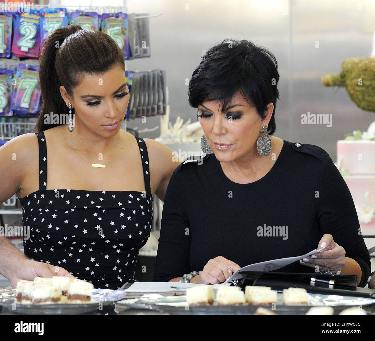 Kris Jenner and daughter Kim Kardashian are seen wedding cake shopping