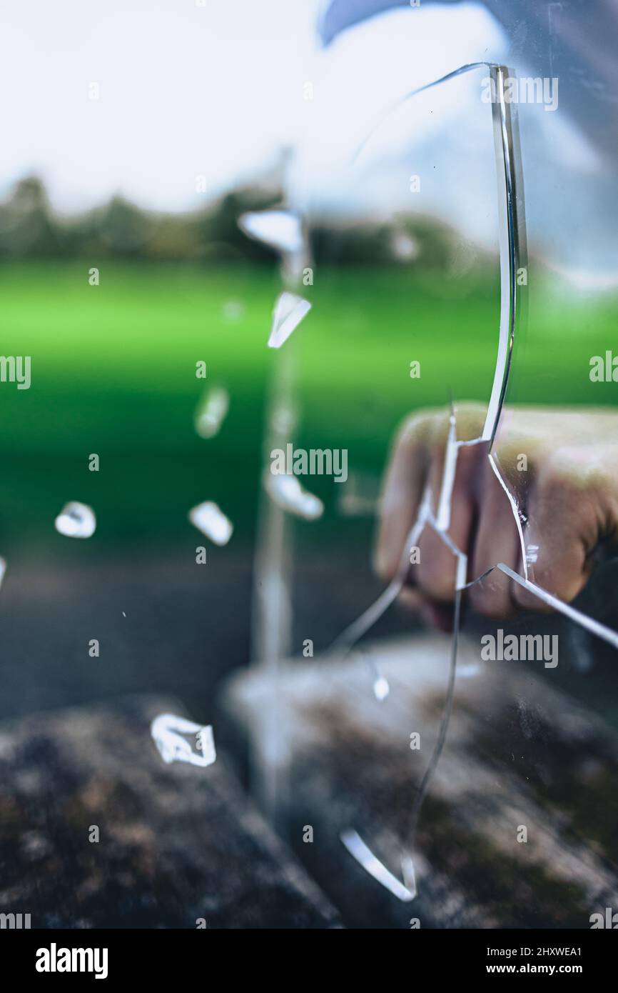 Punching breaking glass hires stock photography and images Alamy