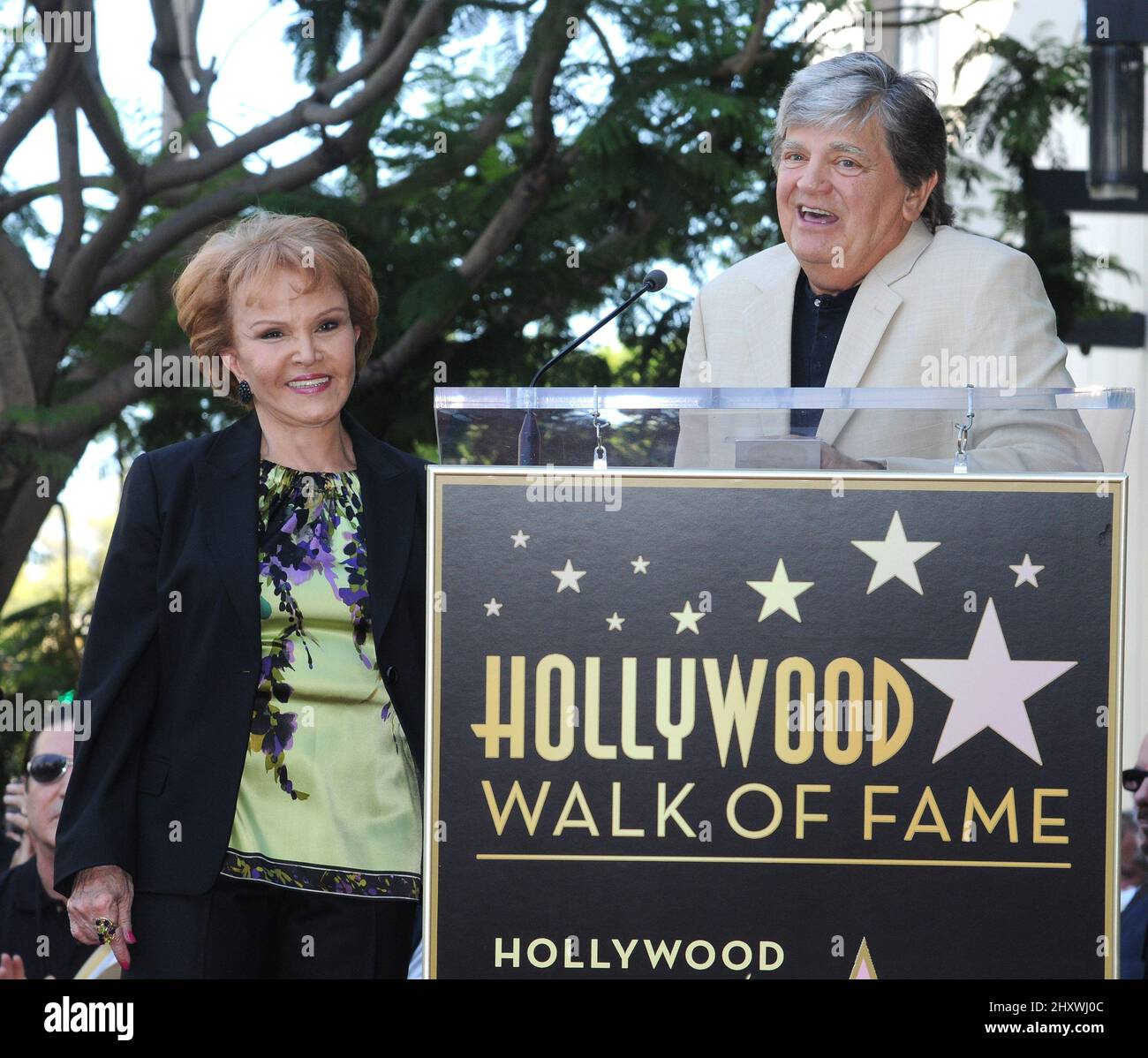 Maria Elena Holly and Phil Everly as Buddy Holly is honored on the Hollywood Walk of Fame in front of the Capital Records Building, Hollywood, California on September 07, 2011. Stock Photo