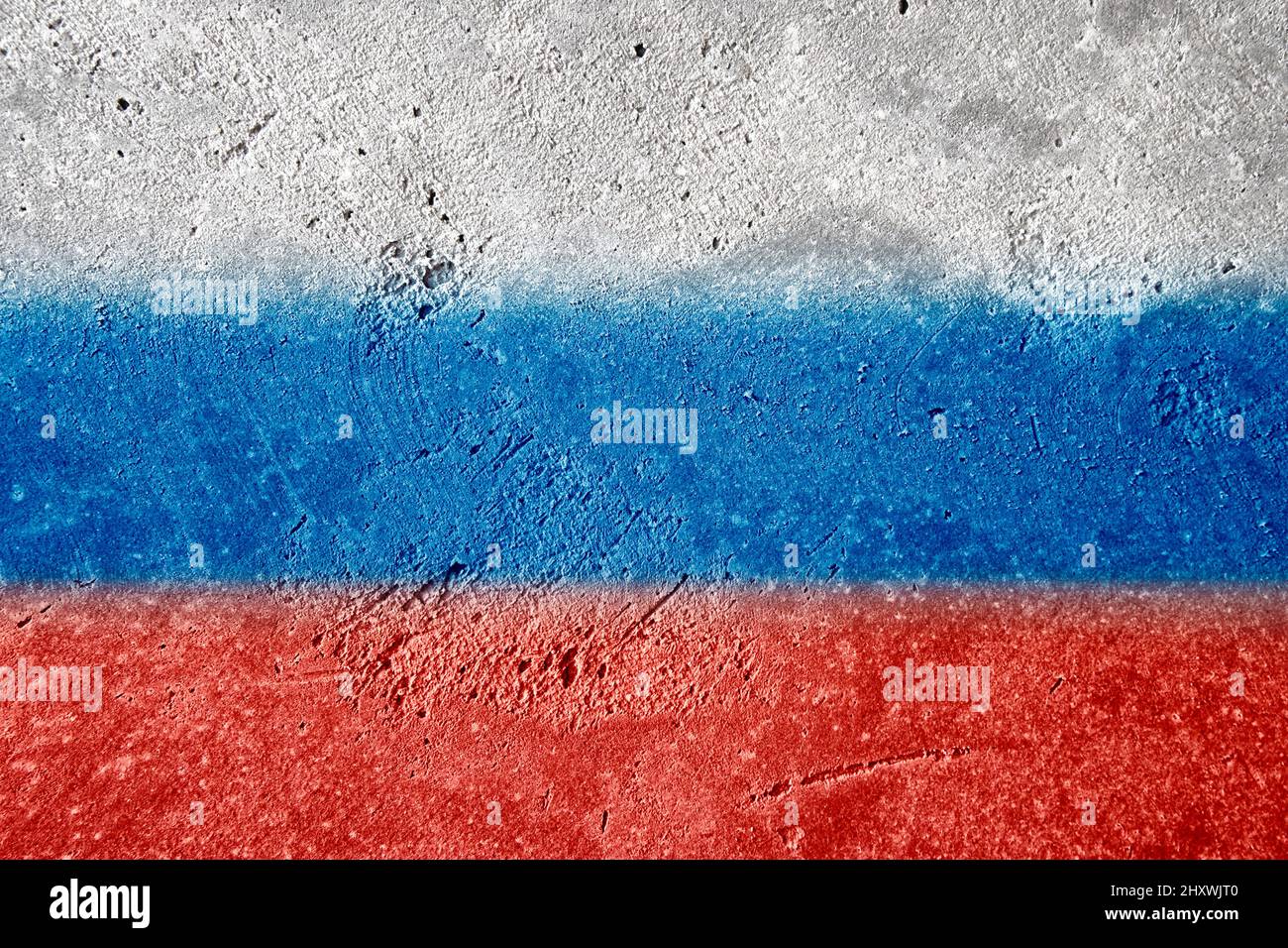 Russian national flag graffiti on detailed plastering wall. White, blue and red colored texture. Stock Photo