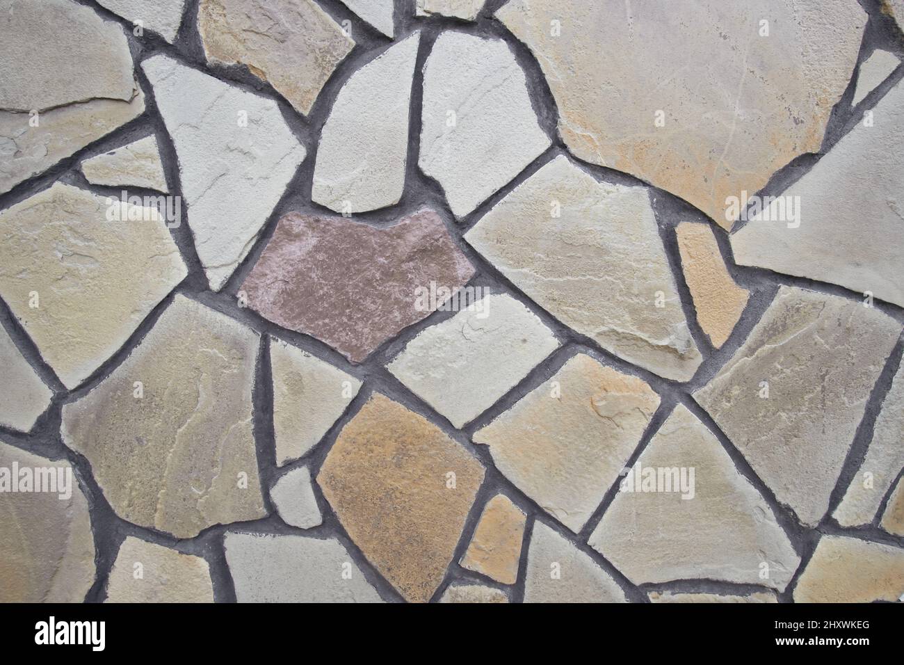 The wall lined with decorative stone. Abstract stone background Stock Photo