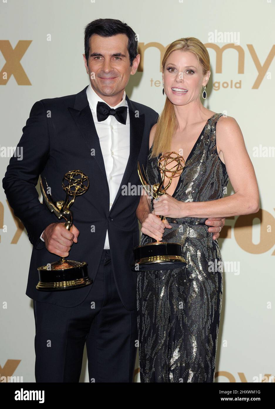 Ty Burrell and Julie Bowen poses in the press room during the 63rd