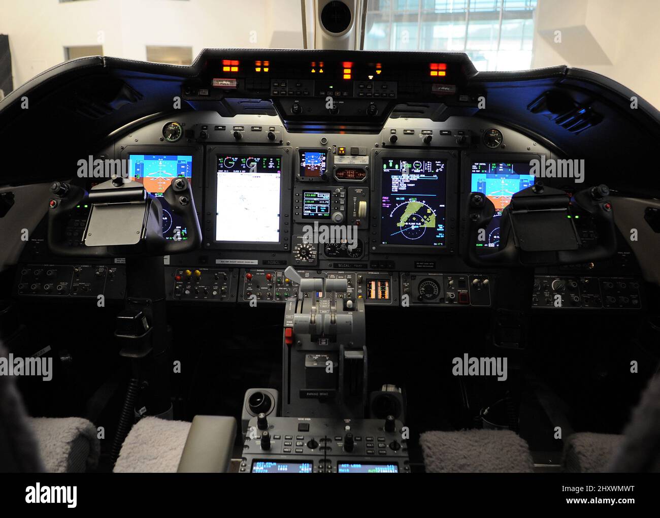 Bombardier's Lear Jet Cockpit as John Travolta joins Bombardier as a business aircraft ambassador during a press conference introducing their newest planes held at Hangar 25 at Burbank Airport. Stock Photo