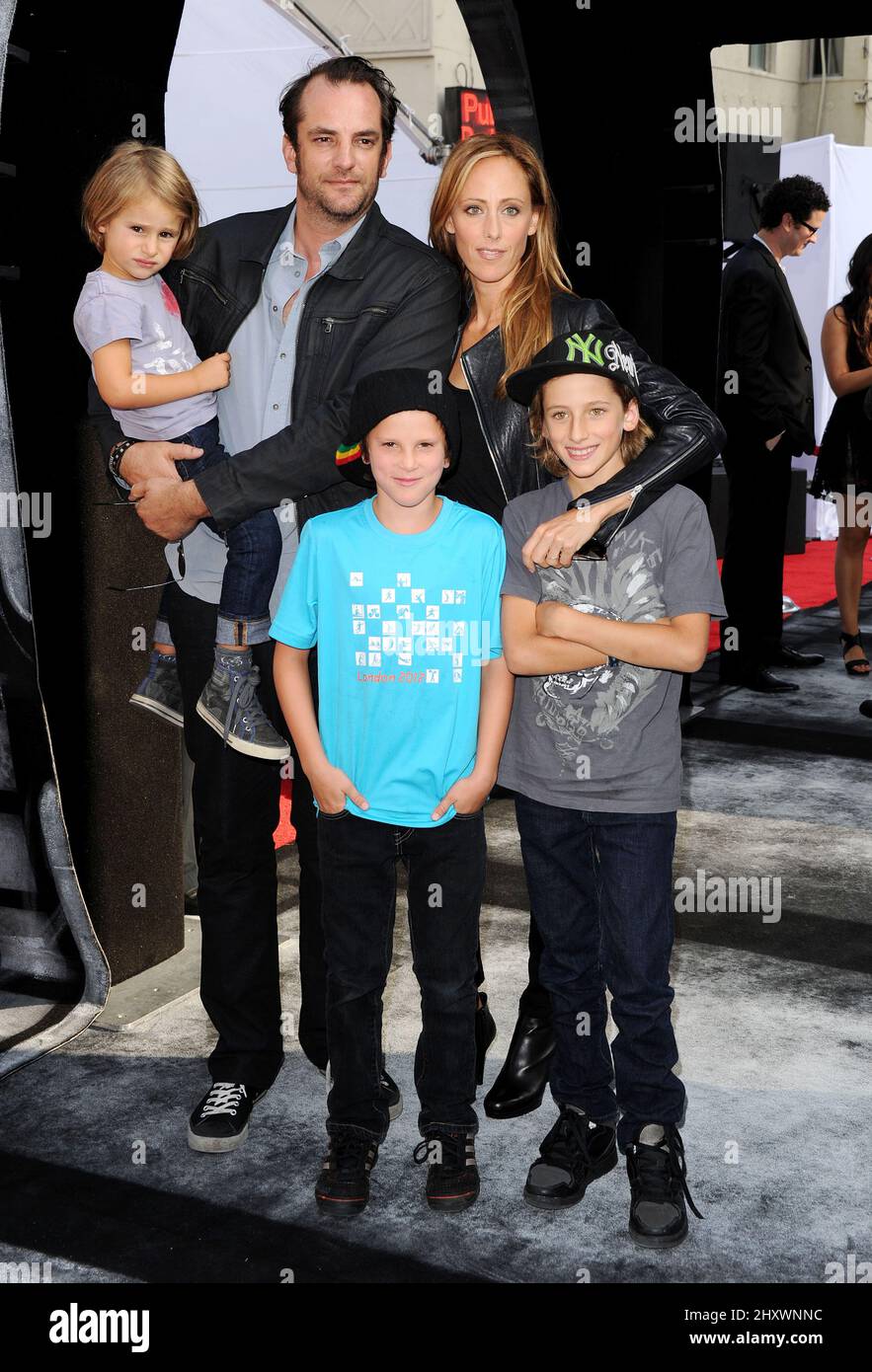 Manu Boyer, Kim Raver and Family attending IRIS A Journey Into The