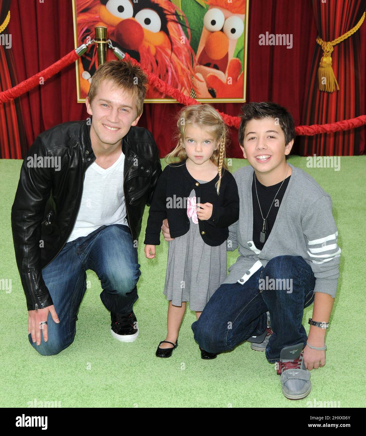 James Dolley, Bradley Steven Perry and Mia Talerico attending 'The Muppets' premiere held at the El Capitan Theatre in Los Angeles, USA. Stock Photo