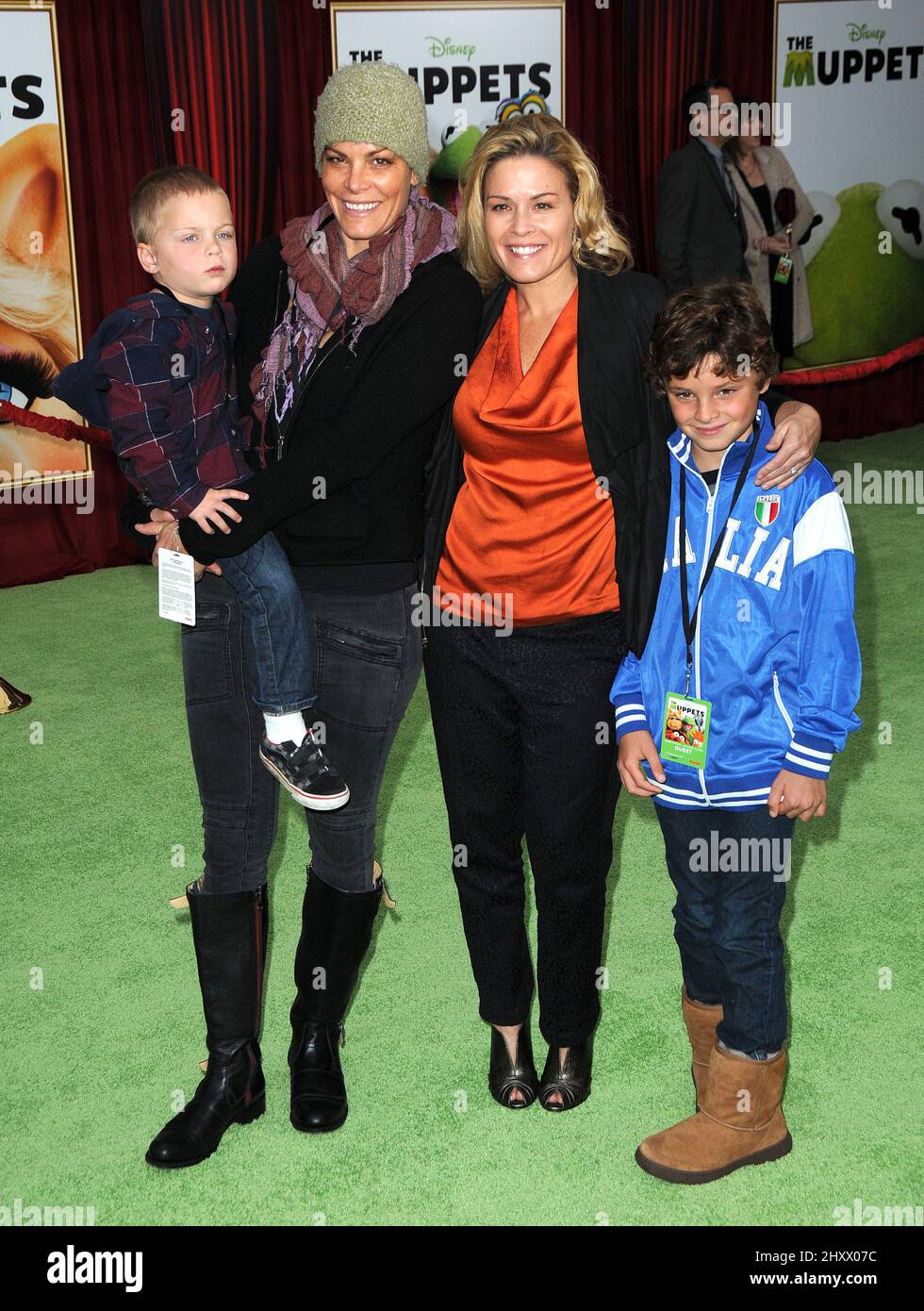 Jennifer Cora, Cat Cora and kids attending "The Muppets" premiere held