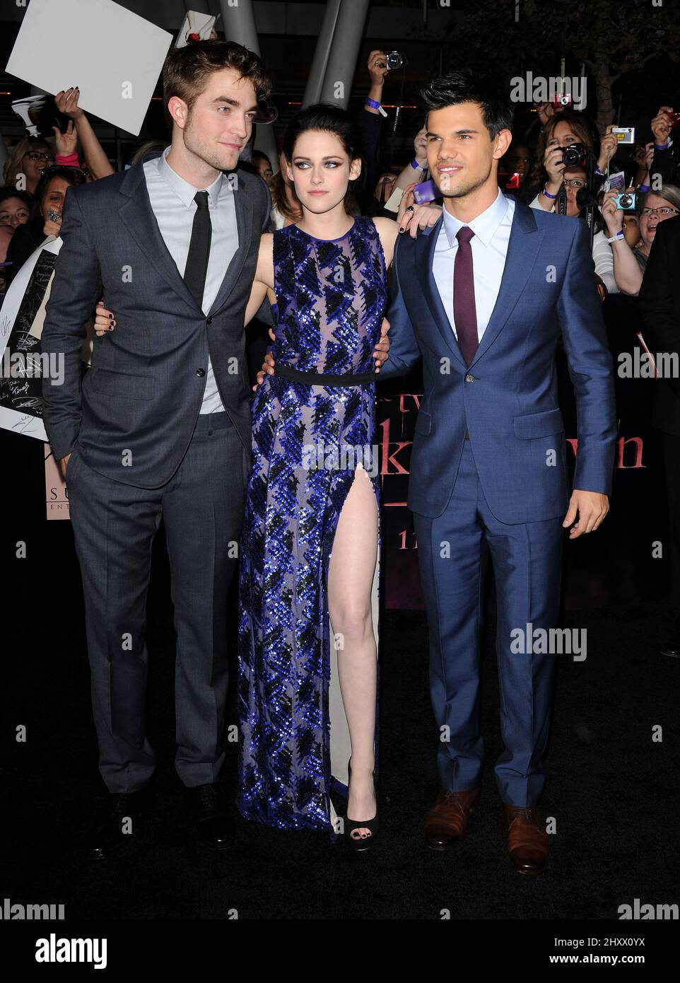 Robert Pattinson, Kristen Stewart and Taylor Lautner arrives at the premiere of 'The Twilight Saga: Breaking Dawn - Part 1' in Los Angeles, USA. Stock Photo