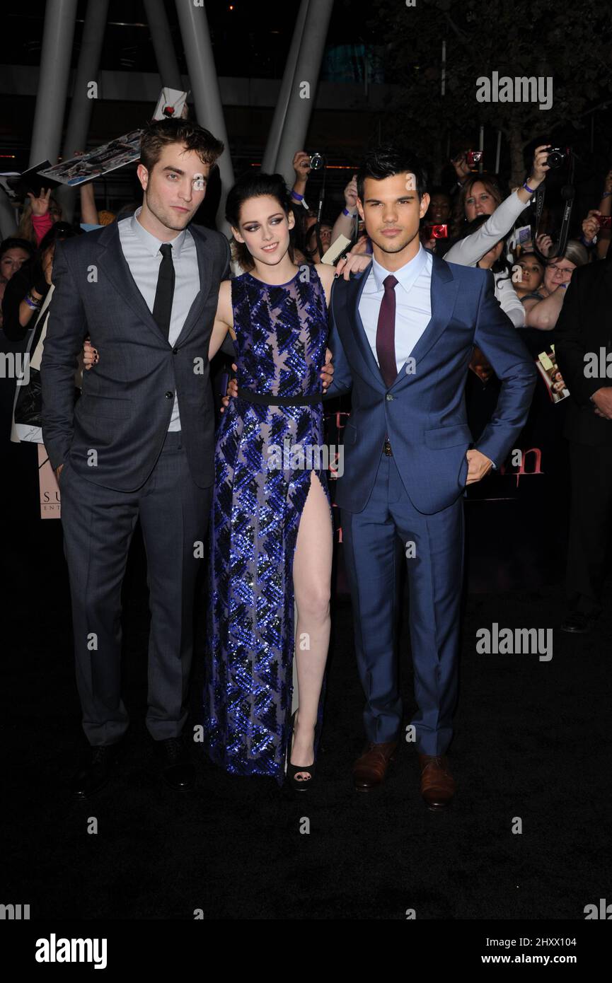 Robert Pattinson, Kristen Stewart and Taylor Lautner arrives at the premiere of 'The Twilight Saga: Breaking Dawn - Part 1' in Los Angeles, USA. Stock Photo