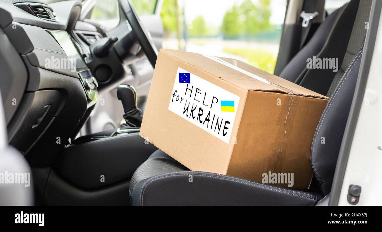 Box with donation clothes for ukrainian refugees suffering from war